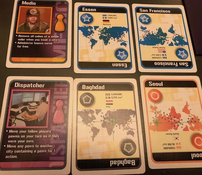 Pandemic role details and cure collection cards
